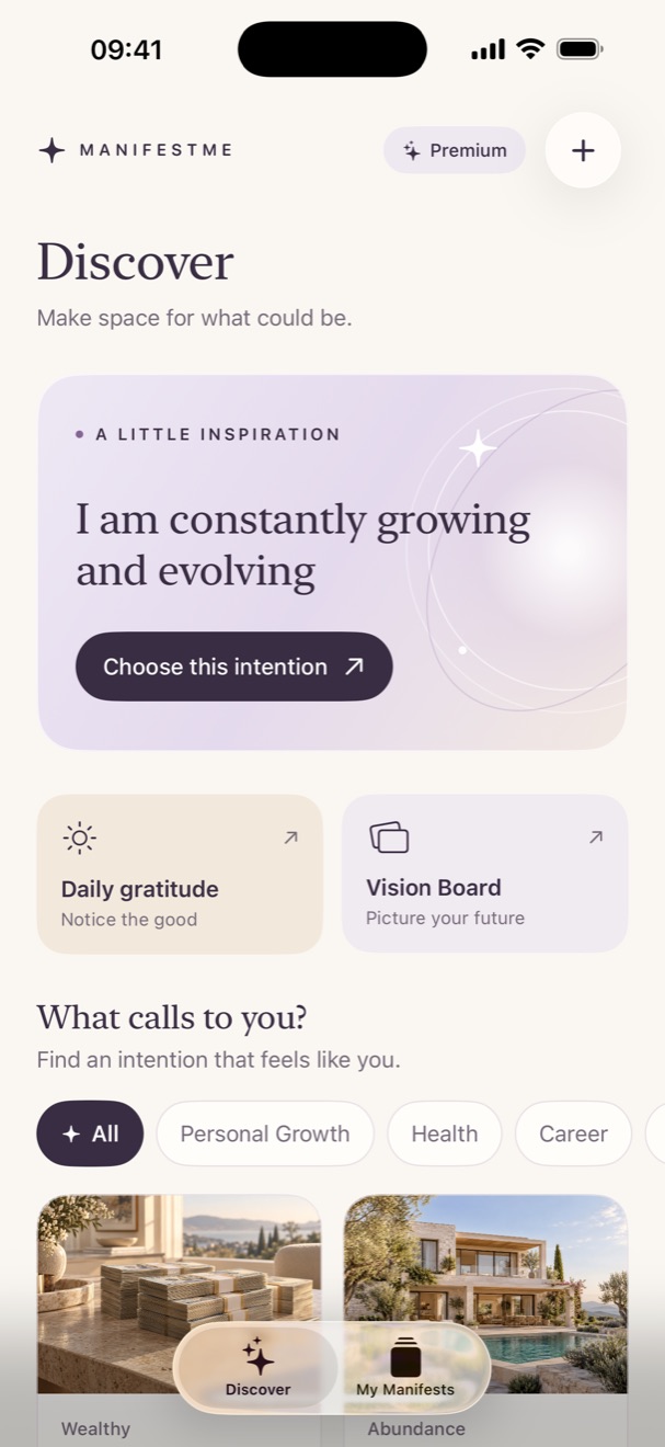 ManifestMe Discover screen with daily gratitude, vision board, and personal intentions.